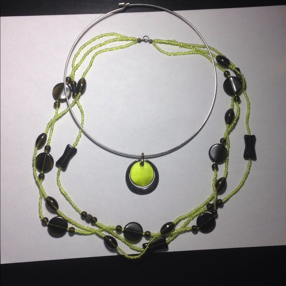 Green,black, and brown necklaces